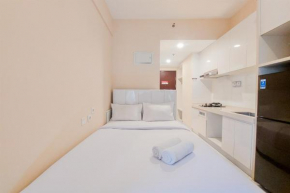Well Furnished and Homey Studio Room Sky House BSD Apartment By Travelio